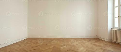 an empty room with white walls and wooden floors at El Establo in Arequipa