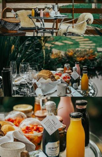 a table topped with lots of food and drinks at Capanna del Vale - Refúgio & Degustação no Vale dos Vinhedos in Bento Gonçalves