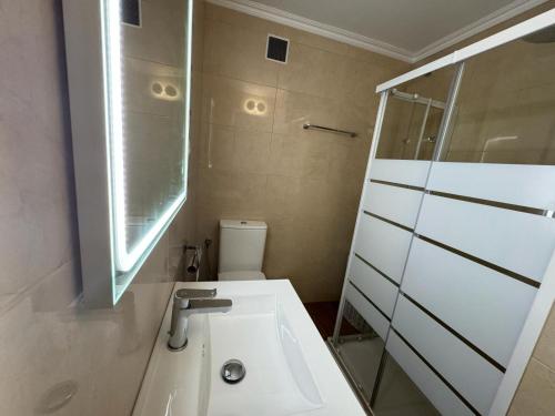 Koupelna v ubytování Acogedor apartamento a 50 metros del mar