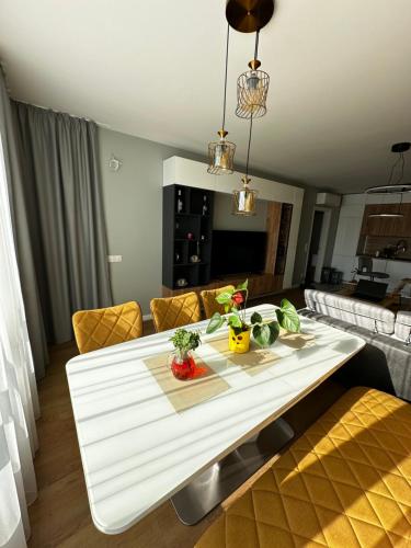 a living room with a table with fruits and vegetables on it at 2 BR Sky Luxury Home and free parking. in Sofia