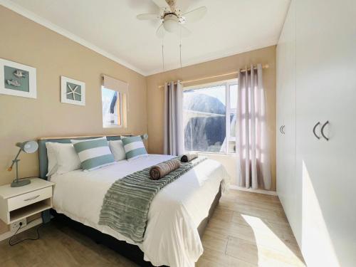 Ένα ή περισσότερα κρεβάτια σε δωμάτιο στο Martinique Cove 18