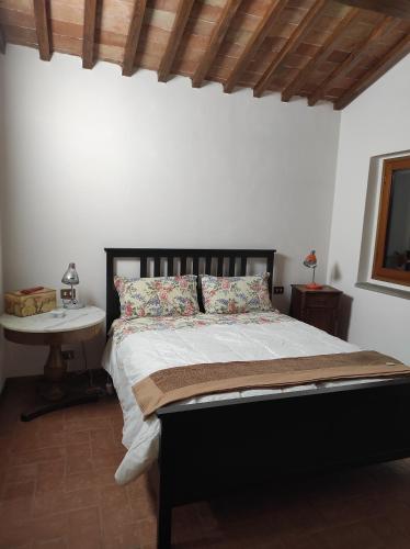 Tempat tidur dalam kamar di Casa al Pero
