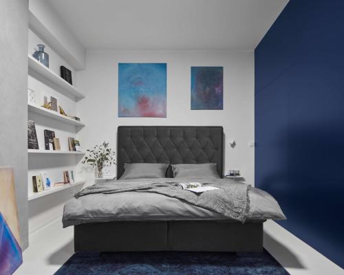 Postel nebo postele na pokoji v ubytování Grace Apartment by Prague Castle