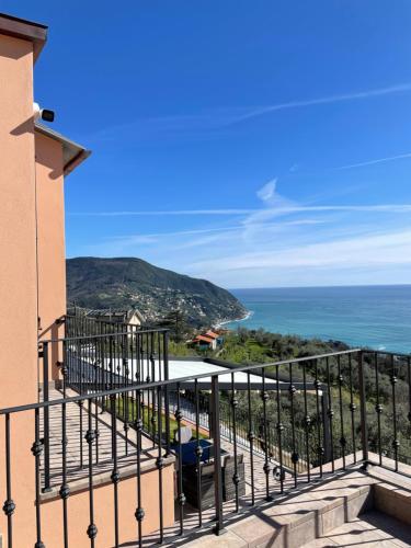 a balcony with a view of the ocean at Villa Nina in Moneglia