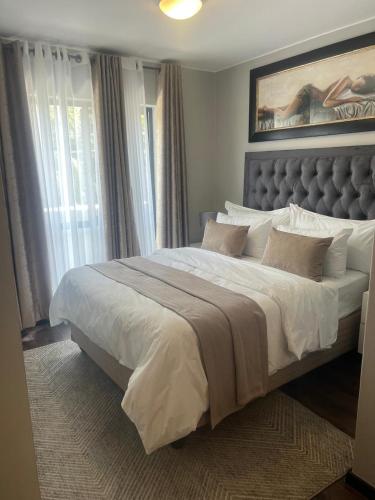 Katil atau katil-katil dalam bilik di BIG DREAMS LUXURY SUITE RIVONIA