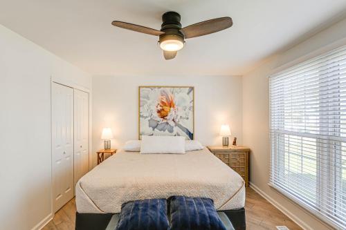 a bedroom with a bed and a ceiling fan at Pet-Friendly Getaway 15 Mi to Downtown Nashville in Hermitage