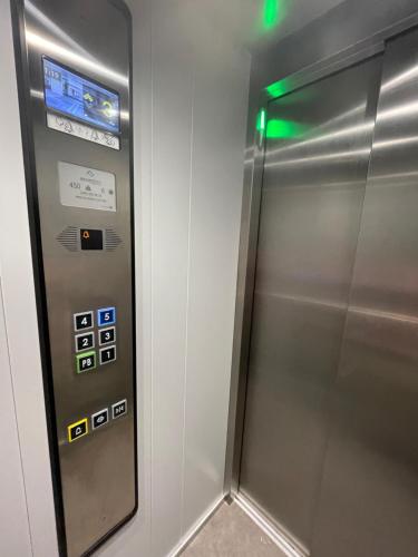 a metal elevator in a subway train at TORRE YAX-CHE URBAN CENTER in Cancún