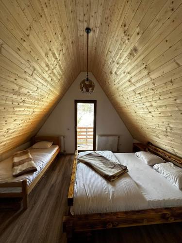 En eller flere senge i et værelse på Art Resort
