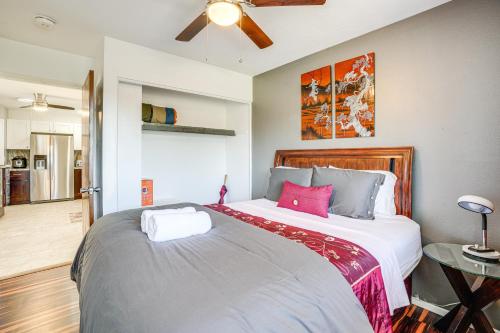 a bedroom with a large bed and a ceiling fan at Modern Prescott Apartment Walk to Downtown! in Prescott