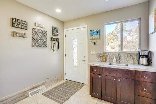 a kitchen with a sink and a window at Modern Prescott Apartment Walk to Downtown! in Prescott