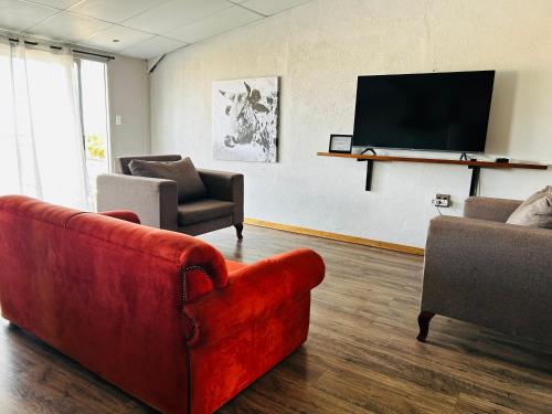 TV a/nebo společenská místnost v ubytování Namgate Guesthouse