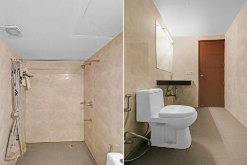 a bathroom with a toilet and a shower at Galaxyy The Hotel Near Delhi Airport in New Delhi