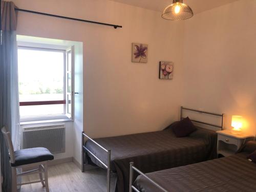 Postel nebo postele na pokoji v ubytování Gîte Etcharnia
