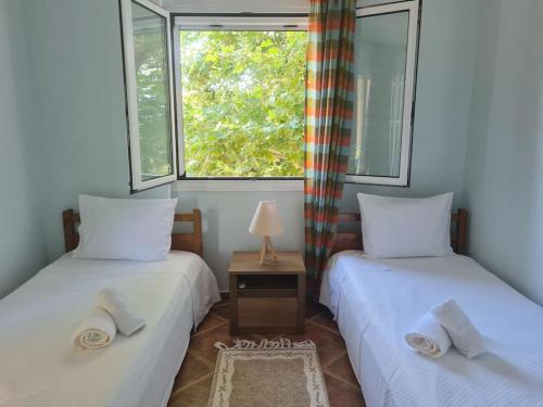 Cama o camas de una habitación en Filiatra Cosy House
