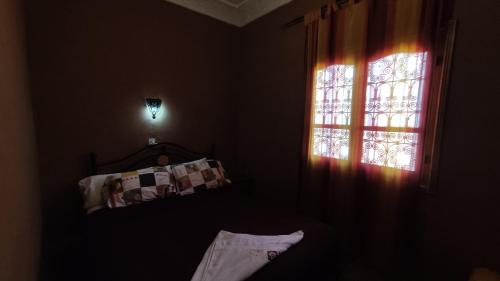 Postel nebo postele na pokoji v ubytování La Belle étoile