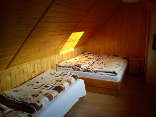 Postel nebo postele na pokoji v ubytování Guest House Pieninka