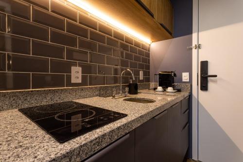 Una cocina o zona de cocina en Charlie Nik Perdizes