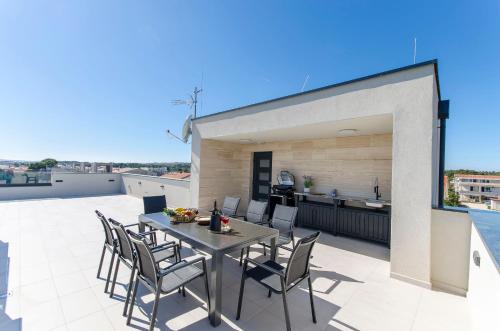 Balkón nebo terasa v ubytování Apartments Villa V2 with rooftop