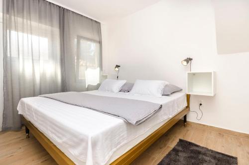 Postel nebo postele na pokoji v ubytování House Violica