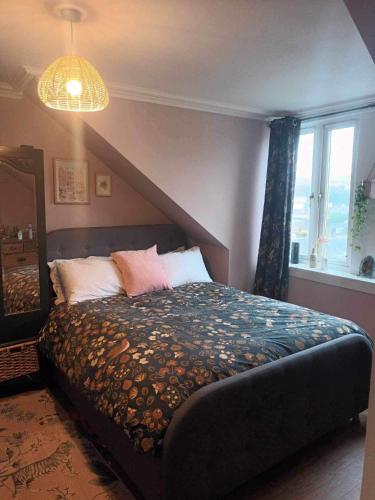 Giường trong phòng chung tại Lovely flat with seaviews