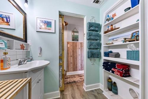 a bathroom with a sink and a toilet at Dog-Friendly Jacksonville Beach Apt near Beach in Jacksonville Beach