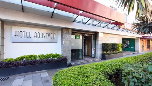 a hotel lobby with a sign that reads hotel murphys at Hotel Roosevelt Condesa in Mexico City