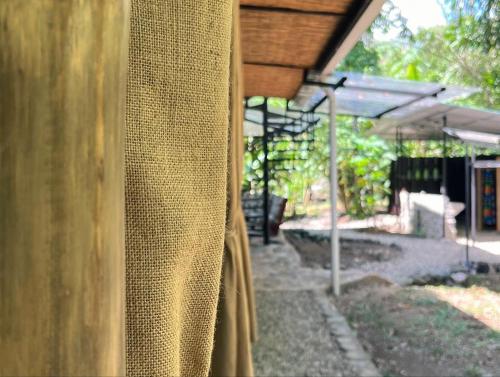 a close up of a window of a house at Templo del Tigre in Dos Brazos