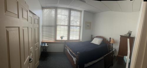Cama o camas de una habitación en Pershing Heights 100