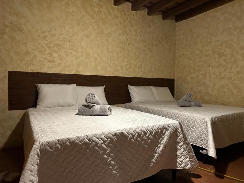 Postel nebo postele na pokoji v ubytování Casa Los Héroes