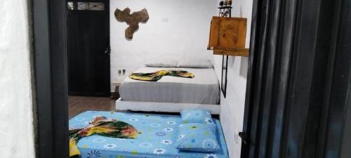 Postel nebo postele na pokoji v ubytování Hospedaje Luz d' Luna