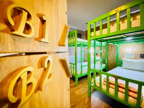 Postel nebo postele na pokoji v ubytování Frutta Hostel