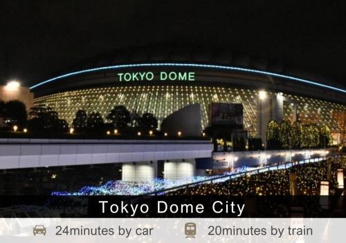 a view of the tokyo dome city at night at Tokyu Stay Ikebukuro in Tokyo