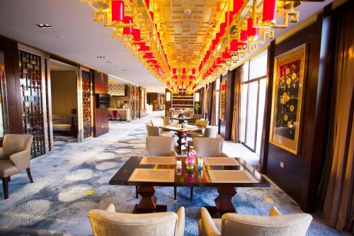 Posezení v ubytování Howard Johnson Changsheng Plaza Meizhou