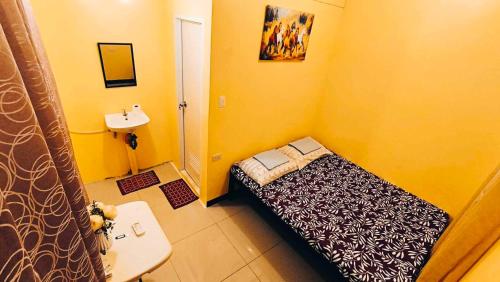 Postel nebo postele na pokoji v ubytování CheRi Backpackers Hostel