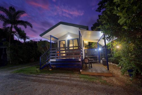 a tiny house sitting on top of a driveway at Thornton Beach Bungalows Daintree in Cape Tribulation