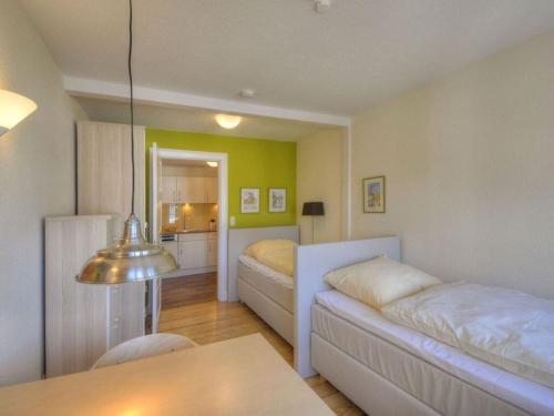 Ένα ή περισσότερα κρεβάτια σε δωμάτιο στο Riechey Comfortable holiday residence