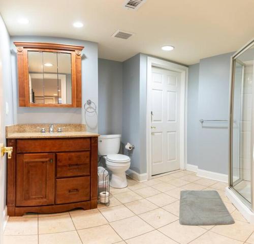 a bathroom with a toilet and a sink and a shower at *RARE* Entire Society Hill House in Philadelphia