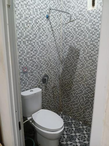 Un baño de Macan Kumbang Residence