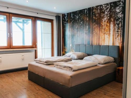 Postel nebo postele na pokoji v ubytování Auszeit am Land