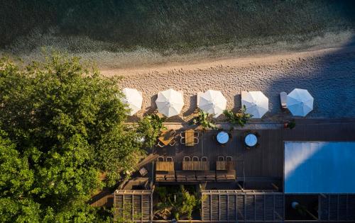 an overhead view of a house next to a beach at Yazz Collective in Fethiye