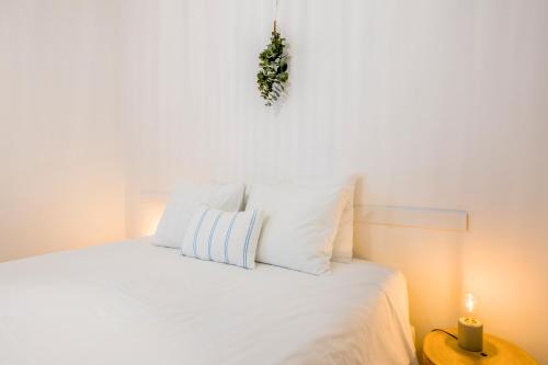 Ένα ή περισσότερα κρεβάτια σε δωμάτιο στο Casa Luma B&B