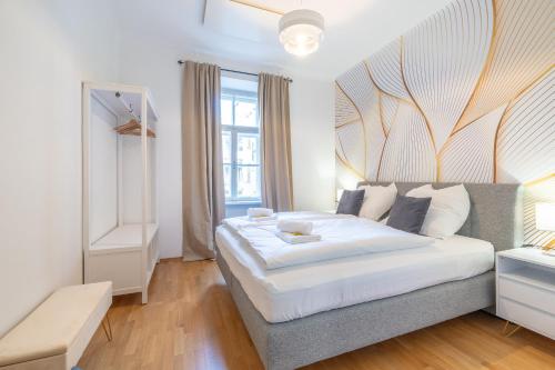 Ένα ή περισσότερα κρεβάτια σε δωμάτιο στο M&O Apartment, Zentral in Innenstadt-& Bahnhofsnähe - PARKGARAGE