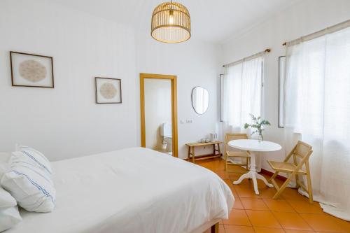 Ένα ή περισσότερα κρεβάτια σε δωμάτιο στο Casa Luma B&B