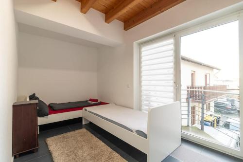 Ένα ή περισσότερα κρεβάτια σε δωμάτιο στο Maisonette-Wohnung mit 5 Schlafzimmern