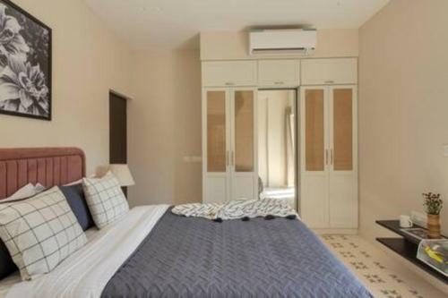 a bedroom with a large bed in a room at Casa Felix · Luxurious 3bhk villa in Colva in Goa