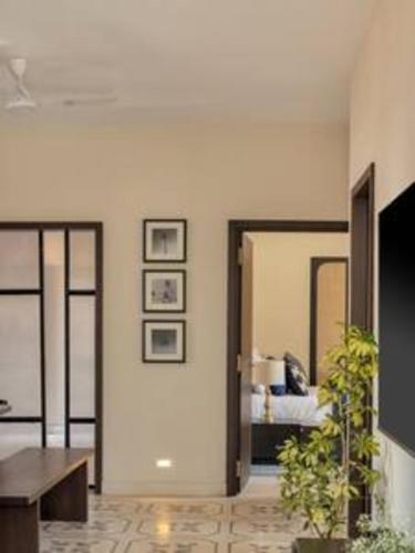 a room with a bedroom with a bed in it at Casa Felix · Luxurious 3bhk villa in Colva in Goa