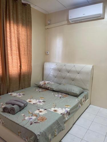 Katil atau katil-katil dalam bilik di B&K Homestay Lahad Datu