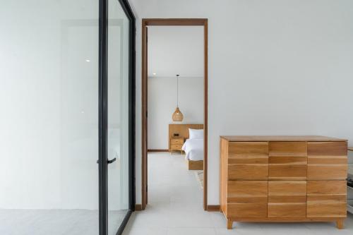Ένα ή περισσότερα κρεβάτια σε δωμάτιο στο Villa Ananda Nilaya