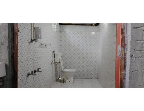 Koupelna v ubytování Lalimou Camp, Assam
