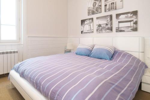 Ένα ή περισσότερα κρεβάτια σε δωμάτιο στο Charmant appartement vue mer Les Sables - 2 personnes